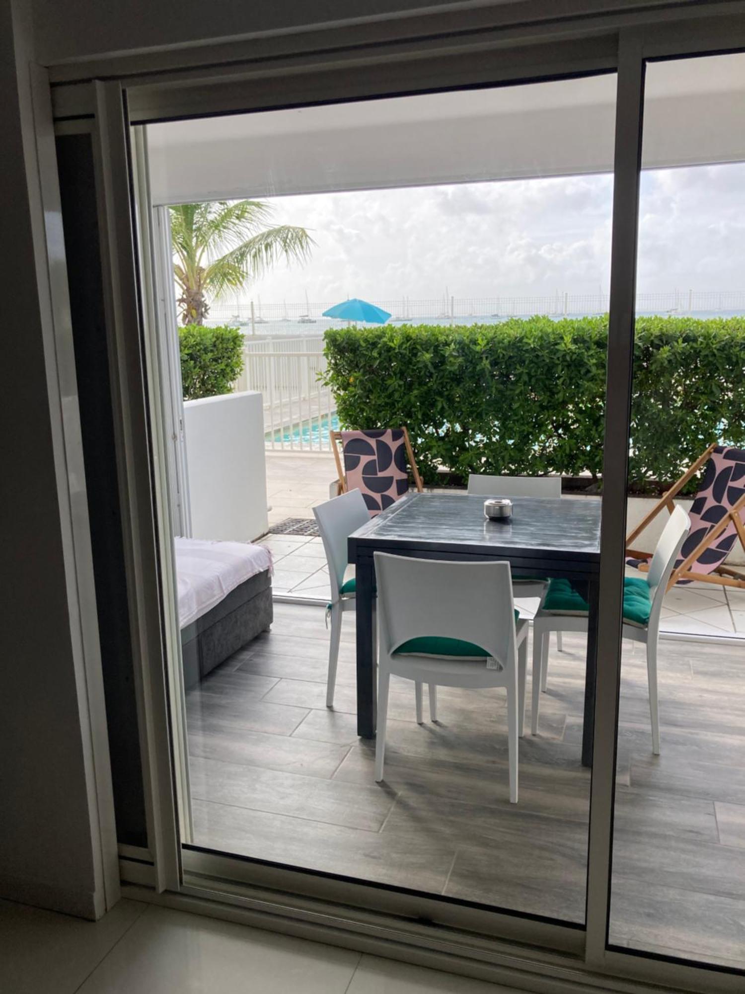 Appartement Pieds Dans L'Eau Vue Mer Acces Plage Et Piscine Marigot  Kültér fotó